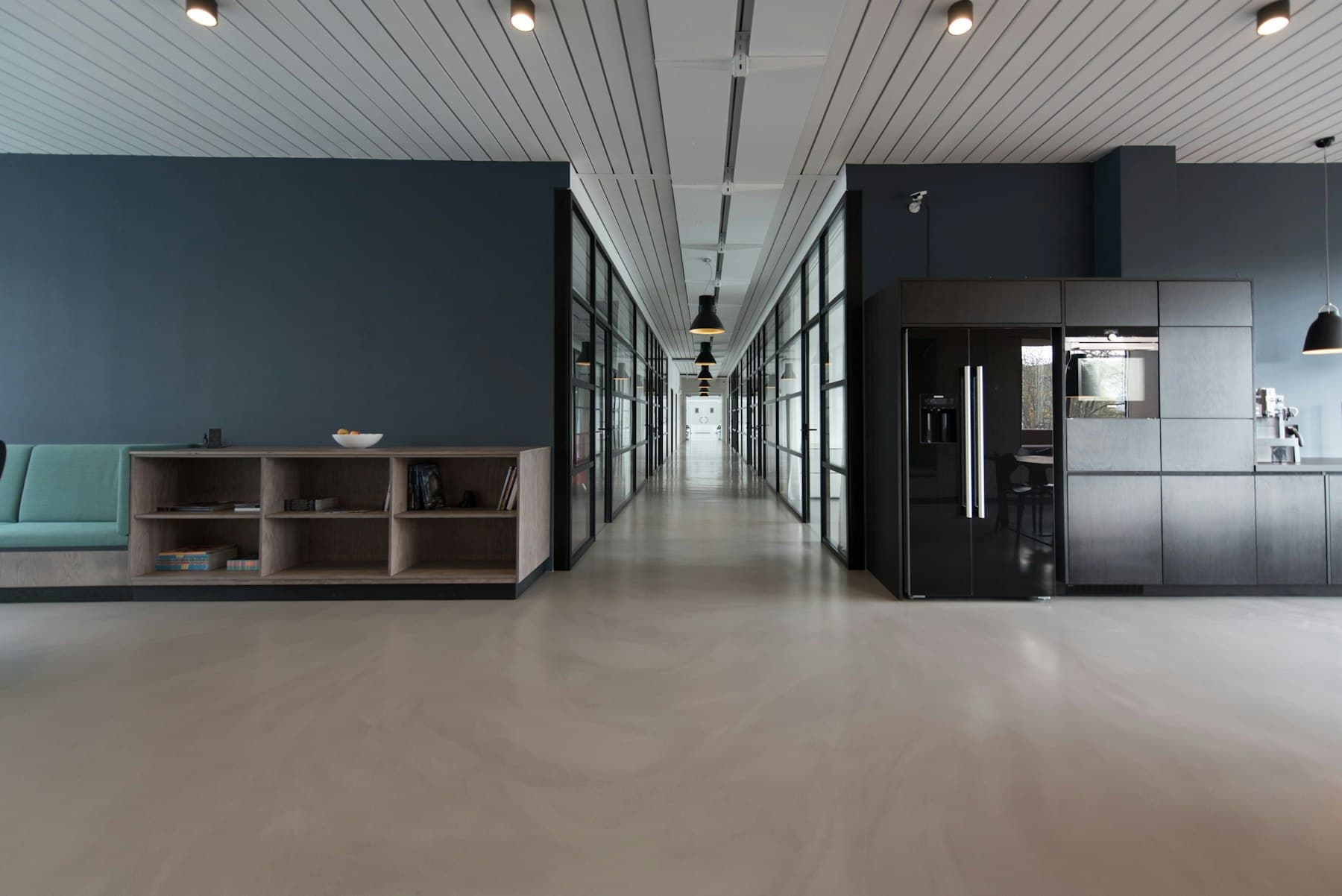 Finished commercial interior with framed partitions and acoustic ceiling